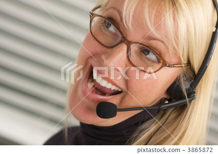 Attractive Businesswoman with Phone Headset Attractive Businesswoman with Phone Headset 3865872
