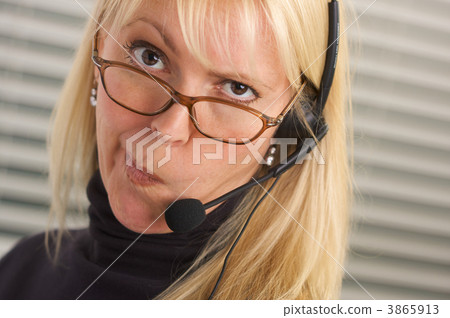 Attractive Businesswoman with Phone Headset Attractive Businesswoman with Phone Headset 3865913
