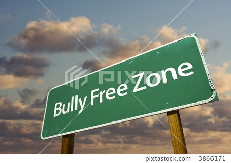 Bully Free Zone Green Road Sign and Clouds Bully Free Zone Green Road Sign and Clouds 3866171