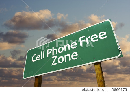 Cell Phone Free Zone Green Road Sign and Clouds Cell Phone Free Zone Green Road Sign and Clouds 3866173