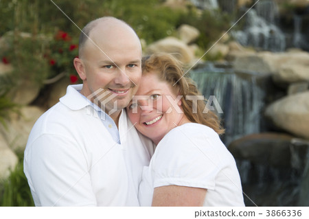 Attractive Couple Portrait in Park Attractive Couple Portrait in Park 3866336