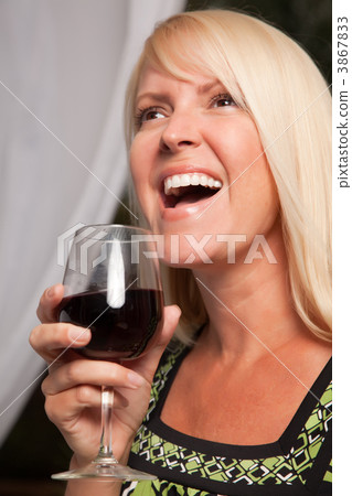 Beautiful Blonde Enjoying Wine 3867833
