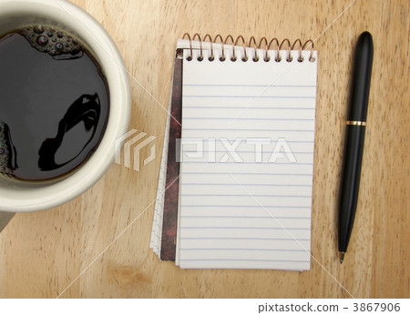 Note Pad Cup and Pen on Wood 3867906