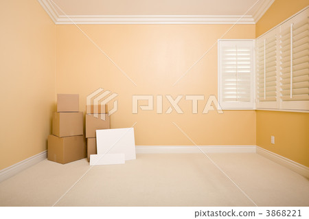 Moving Boxes and Blank Signs on Floor in Empty Room 3868221