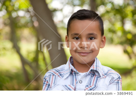 Handsome Young Boy in the Park Handsome Young Boy in the Park 3869491