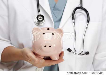 Doctor with Stethoscope Holding Piggy Bank Abstract Doctor with Stethoscope Holding Piggy Bank Abstract 3869505