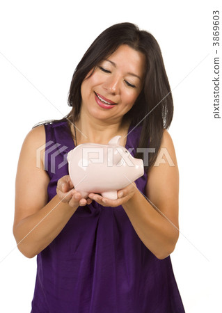 Smiling Hispanic Woman Holding Piggy Bank on White Smiling Hispanic Woman Holding Piggy Bank on White 3869603