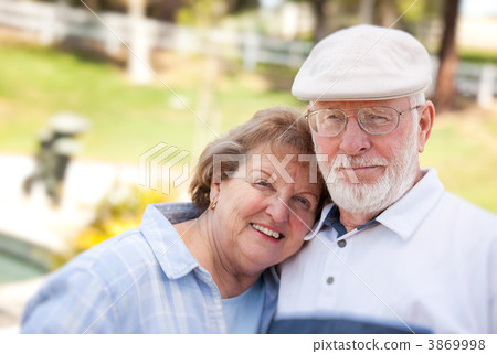 Happy Senior Couple in The Park 3869998