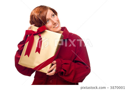 Pretty Red Haired Girl with Wrapped Gift Isolated Pretty Red Haired Girl with Wrapped Gift Isolated 3870001