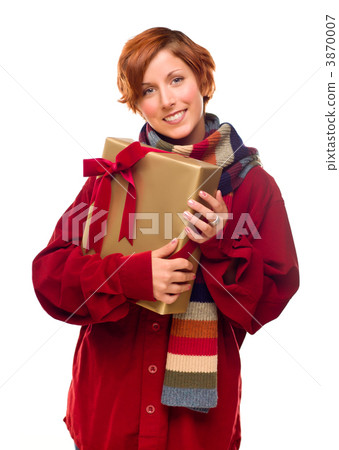 Pretty Red Haired Girl with Scarf Holding Wrapped Gift Pretty Red Haired Girl with Scarf Holding Wrapped Gift 3870007