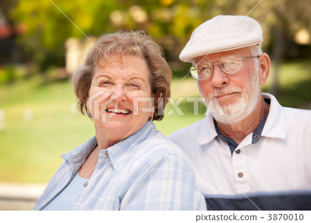 Happy Senior Couple in The Park Happy Senior Couple in The Park 3870010