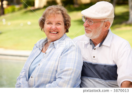 Happy Senior Couple in The Park 3870013
