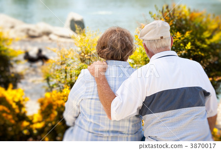 Happy Senior Couple in The Park Happy Senior Couple in The Park 3870017