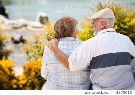 Happy Senior Couple in The Park Happy Senior Couple in The Park 3870018