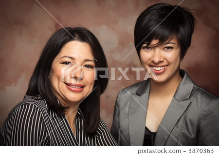 Attractive Multiethnic Mother and Daughter Studio Portrait 3870363
