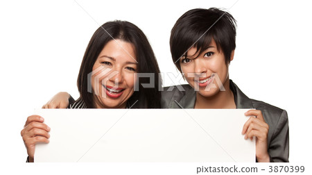 Attractive Multiethnic Mother and Daughters Holding Blank White 3870399