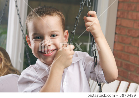 Adorable Young Boy Smiles Adorable Young Boy Smiles 3870459