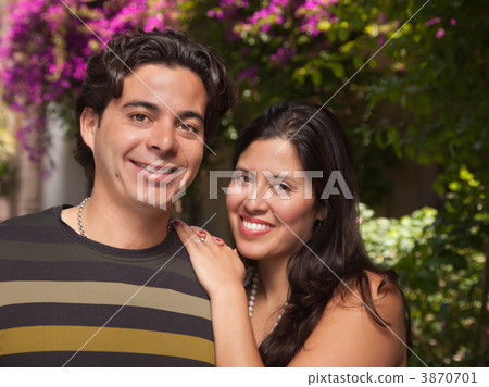 Attractive Hispanic Couple Portrait Outdoors Attractive Hispanic Couple Portrait Outdoors 3870701