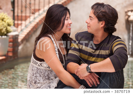 Attractive Hispanic Couple Portrait Outdoors Attractive Hispanic Couple Portrait Outdoors 3870719