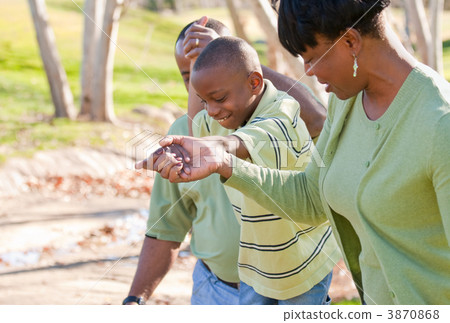 Happy African American Man, Woman and Child Happy African American Man, Woman and Child 3870868