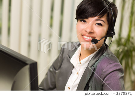 Attractive Young Woman Smiles Wearing Headset Attractive Young Woman Smiles Wearing Headset 3870871