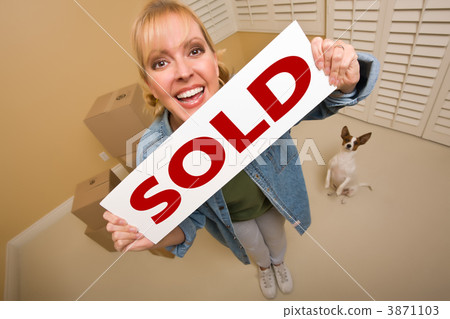 Woman and Doggy with Sold Sign Near Moving Boxes 3871103