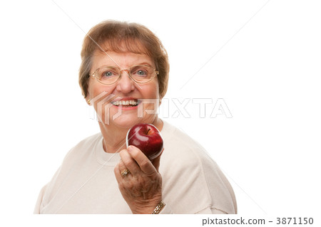 Attractive Senior Woman with Red Apple. Attractive Senior Woman with Red Apple. 3871150