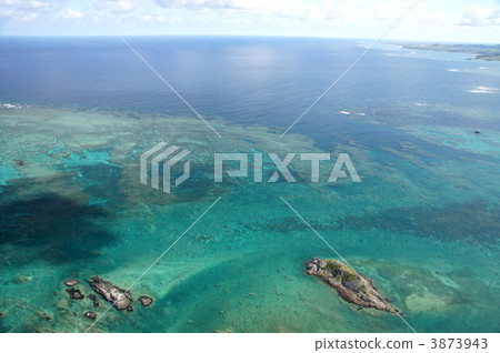 Aerial view of the coral reef of Tamagusaki Aerial view of the coral reef of Tamagusaki 3873943