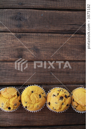 Homemade moist pumpkin muffins with chocolate chips 3875182