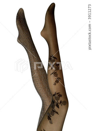 Women's feet wearing stockings 3911273