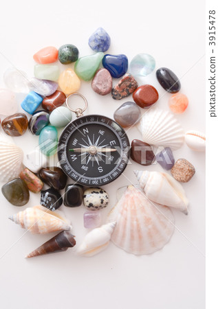 Compass and collection of natural stones and seashells Compass and collection of natural stones and seashells 3915478
