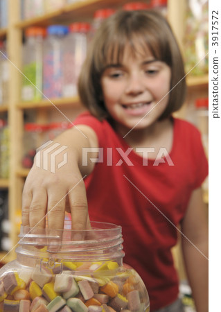 girl in sweet shop girl in sweet shop 3917572