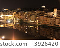 Italy World Heritage Florence Old townscape along the Arno River at night and Ponte Vecchio 3926420