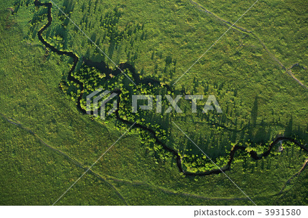 River meandering across Masai Mara River meandering across Masai Mara 3931580