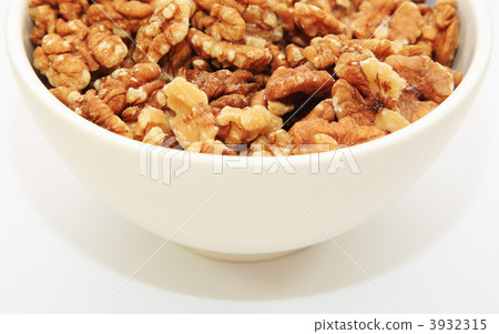 Half a bowl of walnuts Half a bowl of walnuts 3932315