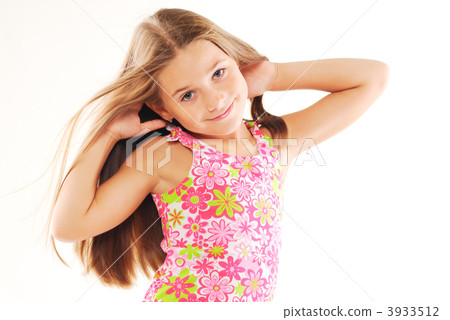 Little blond girl playing with her hair 3933512