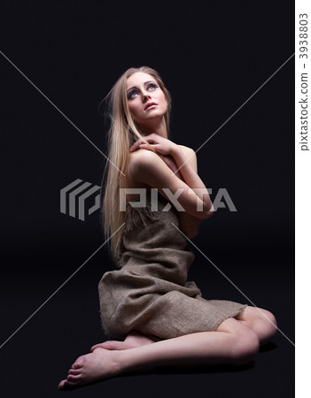 Young girl in sadness look on light with hope 3938803