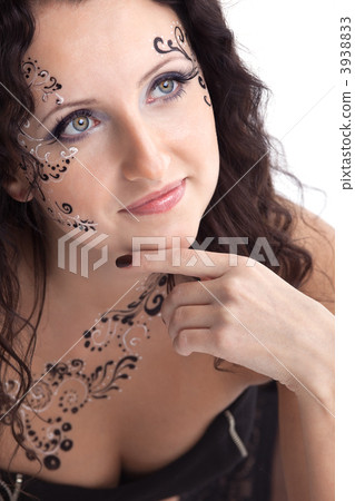 Woman face with paint close-up portrait 3938833