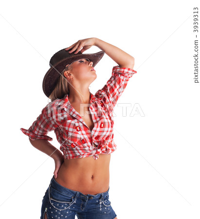 sexy young cowgirl take hand on hat isolated sexy young cowgirl take hand on hat isolated 3939313