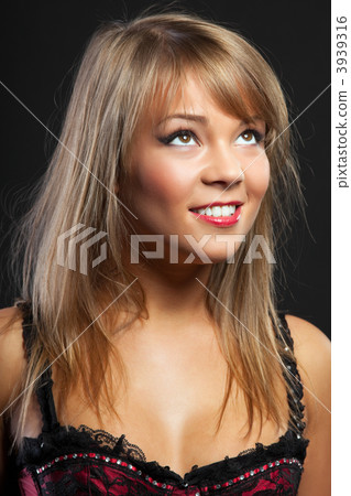 Young sexy woman in corset close up portrait 3939316