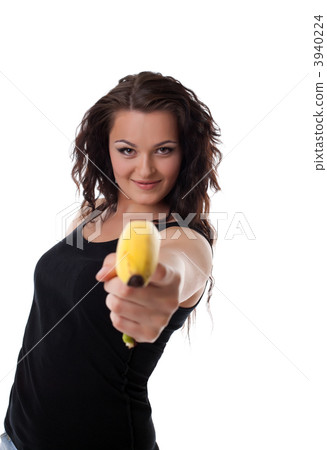 young woman shoot with banana gun young woman shoot with banana gun 3940224