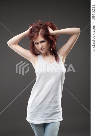 Attractive woman in tank top posing portrait 3940231