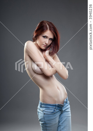 cute young naked brunette girl portrait in jeans 3940236