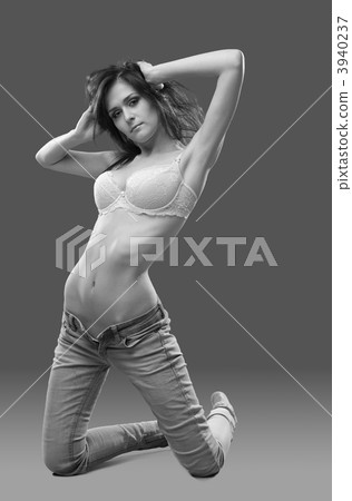 attractive sexy young girl in jeans and bra 3940237