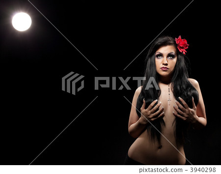 Alone woman in dark take breast with hands Alone woman in dark take breast with hands 3940298