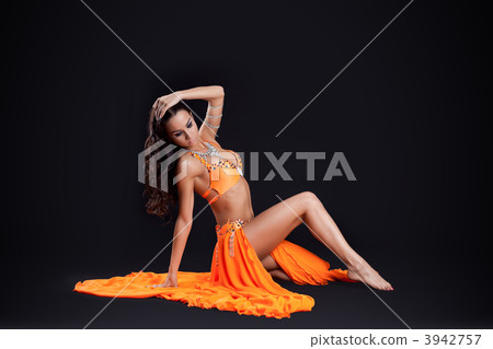 Pretty young woman posing in oriental costume Pretty young woman posing in oriental costume 3942757