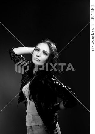 Beautiful grunge sexy woman in leather jacket Beautiful grunge sexy woman in leather jacket 3944301