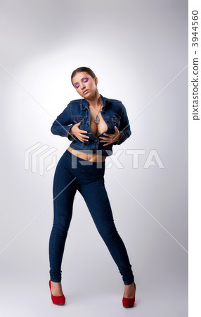 sexy girl posing in jeans dress - take breast - Stock Photo [3944560] -  PIXTA