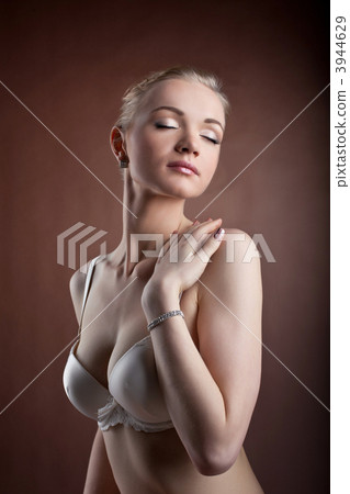 Beautiful woman portrait in white bra Beautiful woman portrait in white bra 3944629