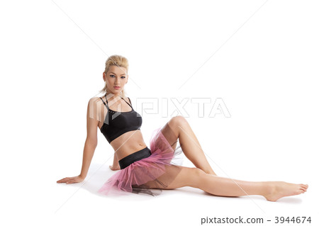Athletic young woman posing in dance sport costume Athletic young woman posing in dance sport costume 3944674